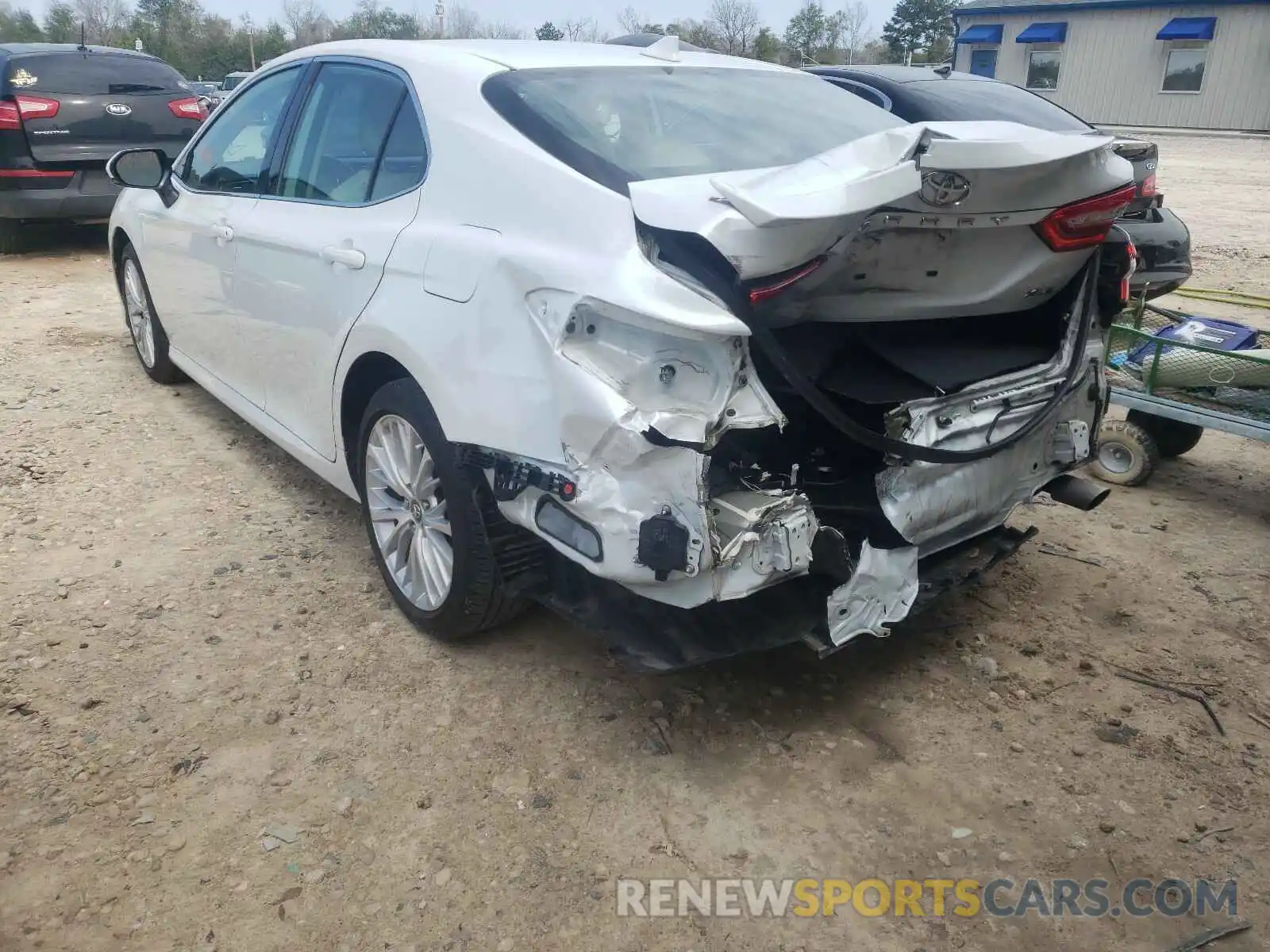 3 Photograph of a damaged car 4T1B11HK3KU694000 TOYOTA CAMRY 2019