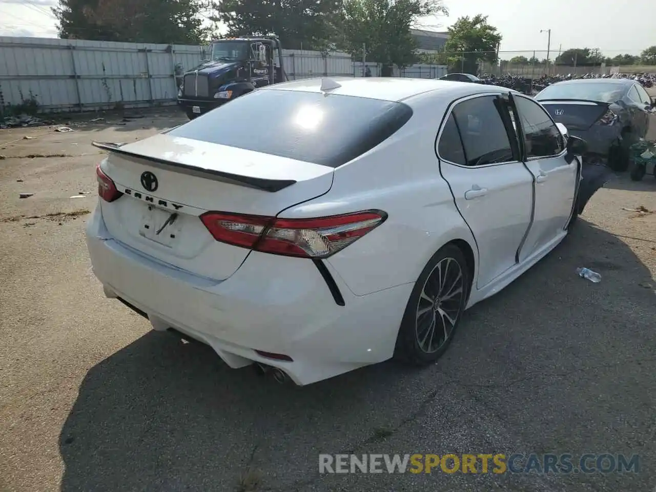 4 Photograph of a damaged car 4T1B11HK3KU694093 TOYOTA CAMRY 2019