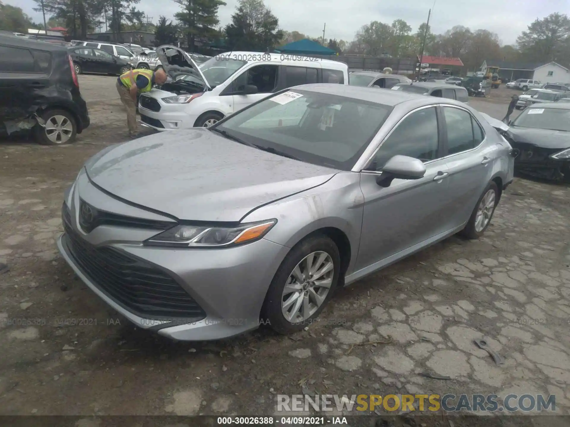 2 Photograph of a damaged car 4T1B11HK3KU696409 TOYOTA CAMRY 2019