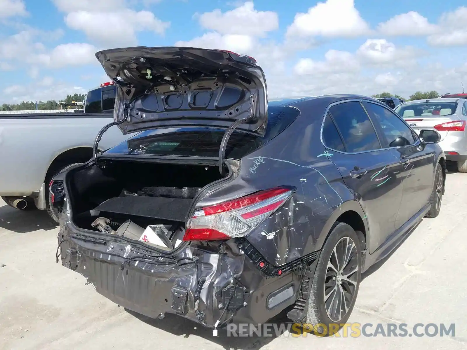 4 Photograph of a damaged car 4T1B11HK3KU697687 TOYOTA CAMRY 2019