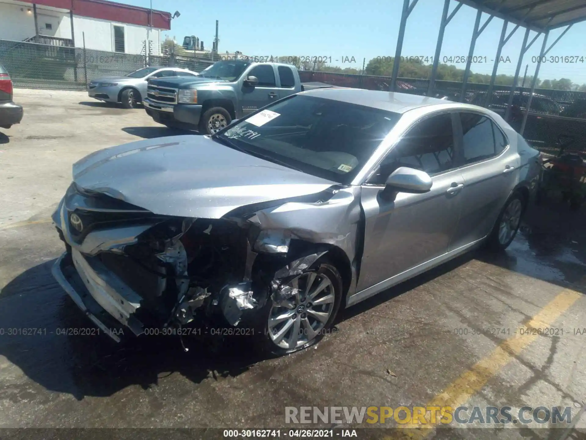 2 Photograph of a damaged car 4T1B11HK3KU698144 TOYOTA CAMRY 2019