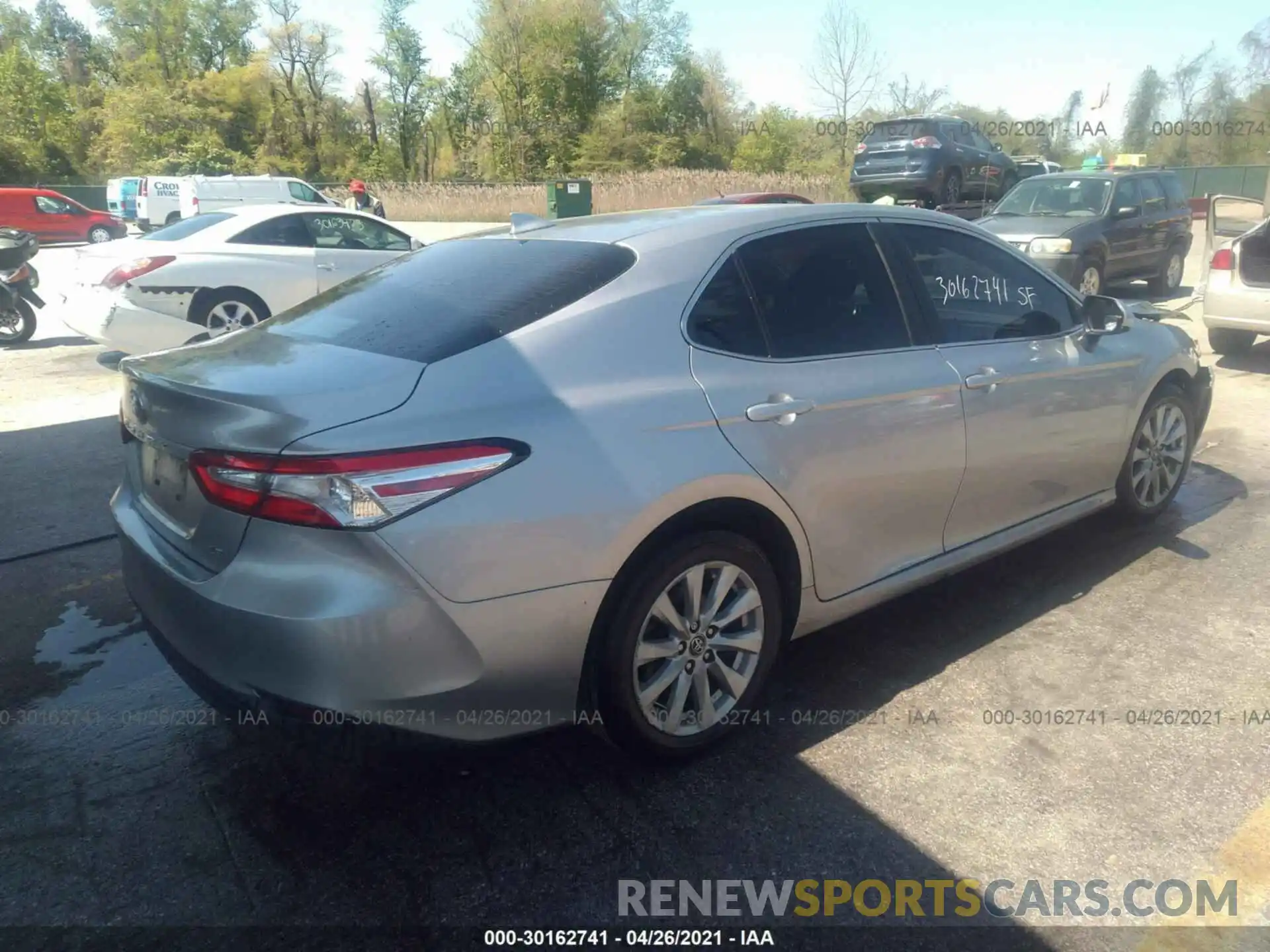 4 Photograph of a damaged car 4T1B11HK3KU698144 TOYOTA CAMRY 2019