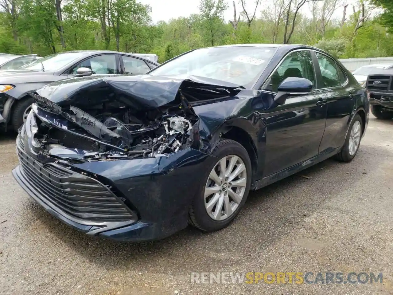 2 Photograph of a damaged car 4T1B11HK3KU700023 TOYOTA CAMRY 2019