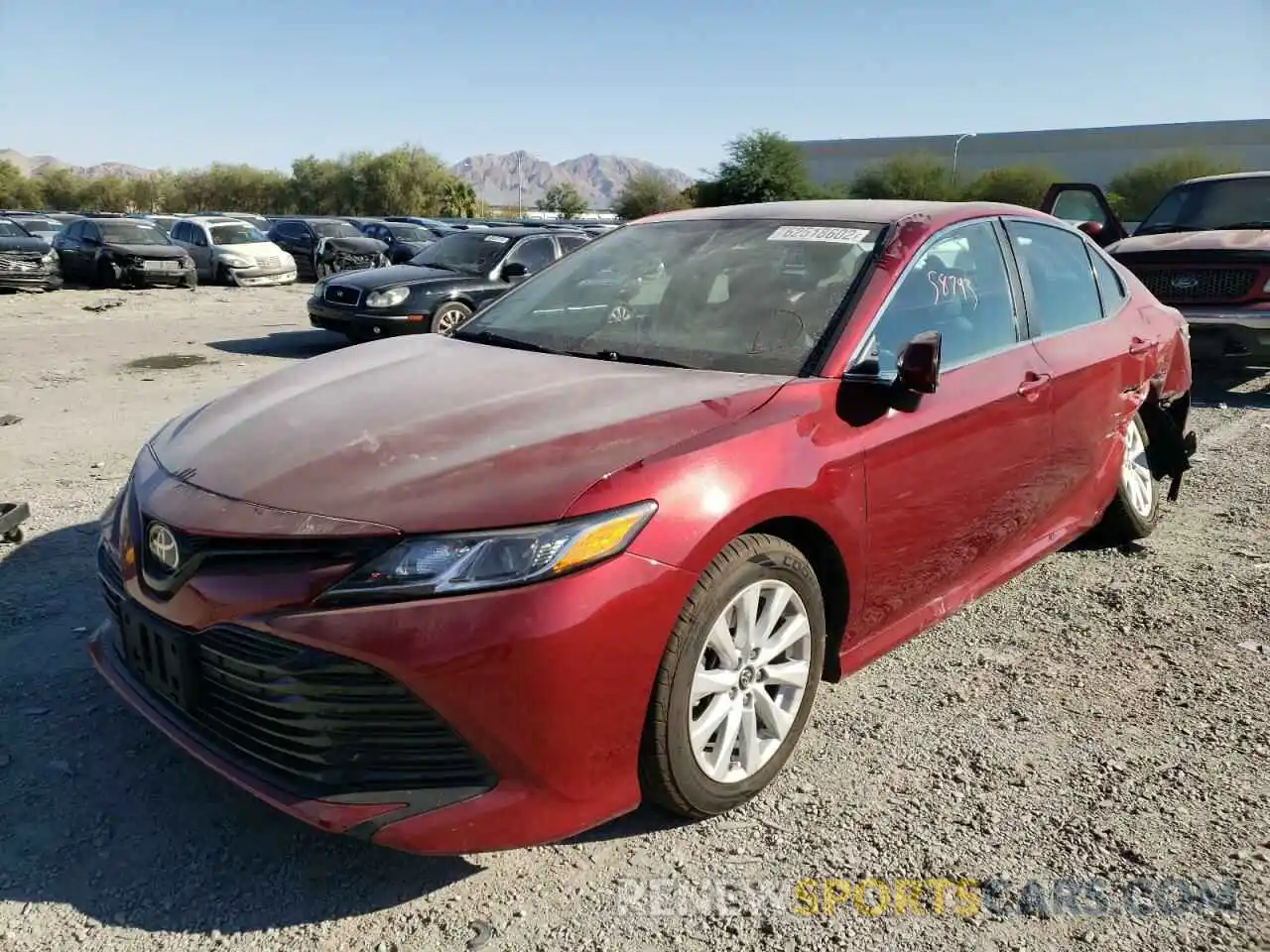 2 Photograph of a damaged car 4T1B11HK3KU700250 TOYOTA CAMRY 2019