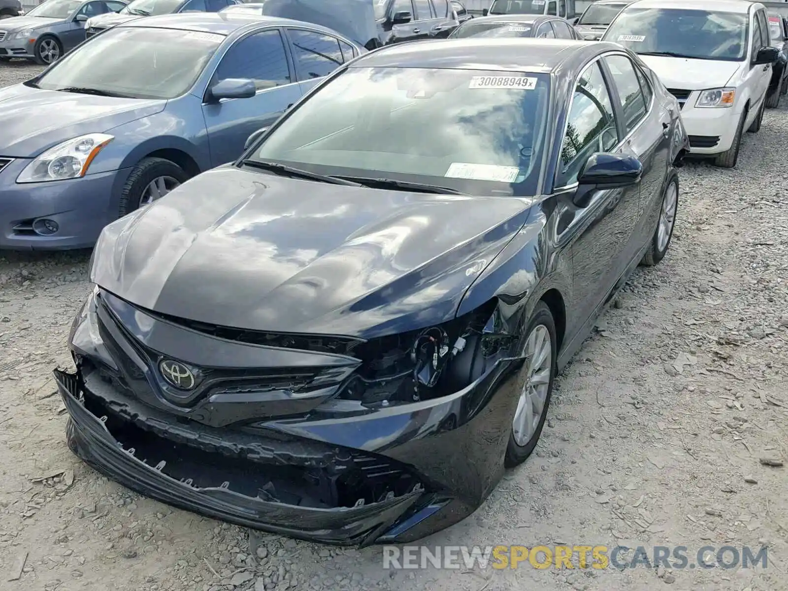 2 Photograph of a damaged car 4T1B11HK3KU700796 TOYOTA CAMRY 2019