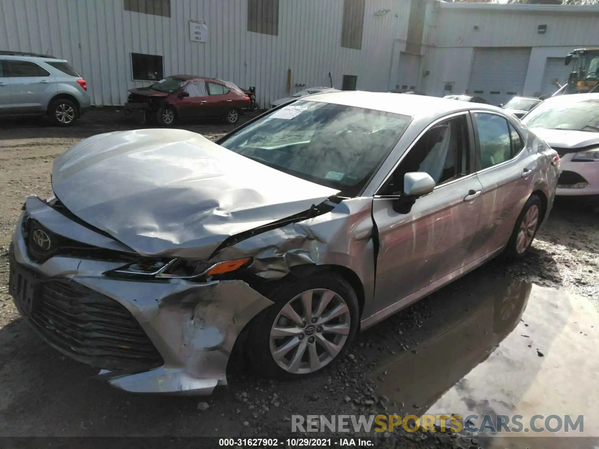 2 Photograph of a damaged car 4T1B11HK3KU701186 TOYOTA CAMRY 2019