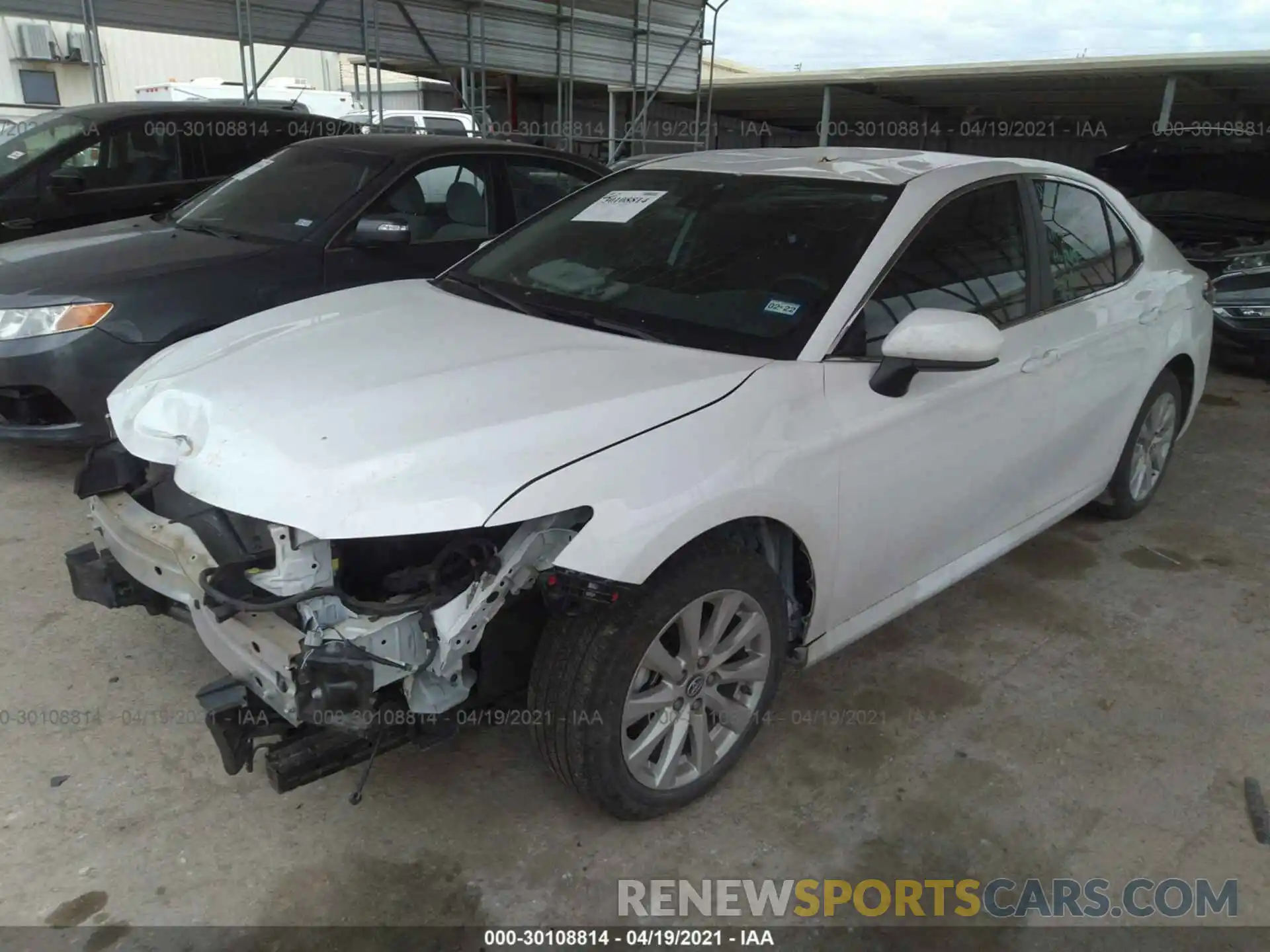 2 Photograph of a damaged car 4T1B11HK3KU701284 TOYOTA CAMRY 2019