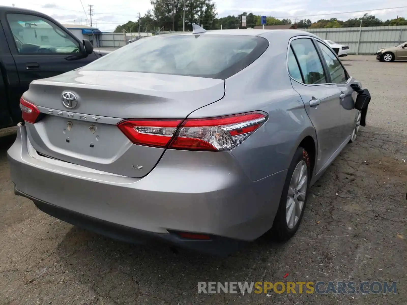 4 Photograph of a damaged car 4T1B11HK3KU702970 TOYOTA CAMRY 2019