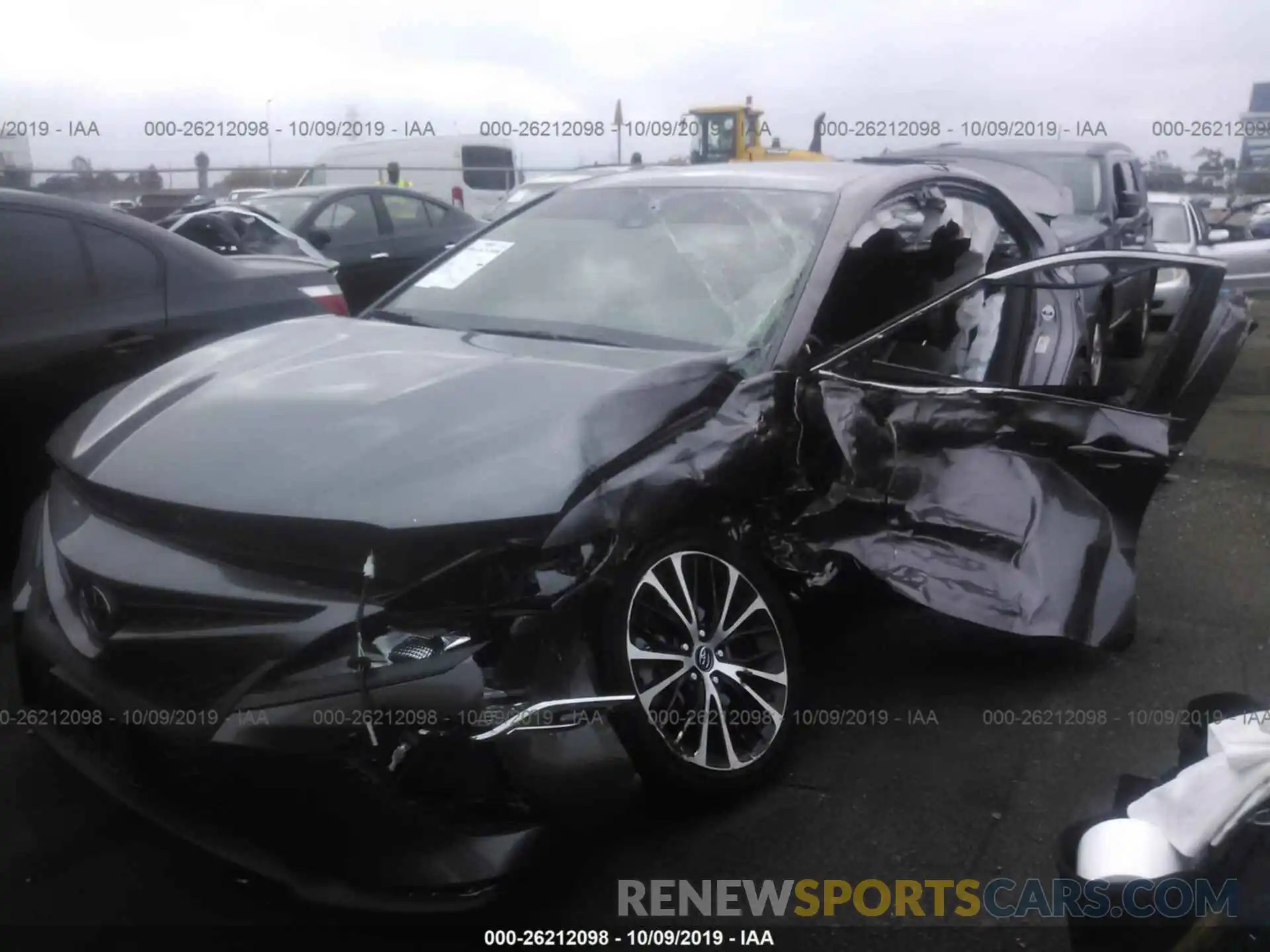 2 Photograph of a damaged car 4T1B11HK3KU704024 TOYOTA CAMRY 2019