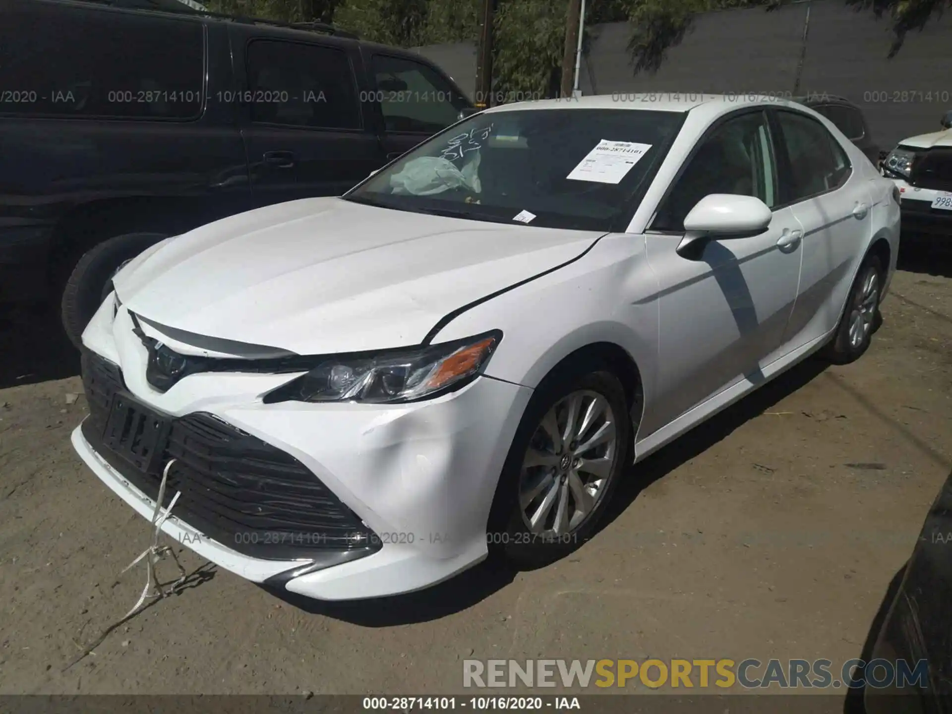 2 Photograph of a damaged car 4T1B11HK3KU705979 TOYOTA CAMRY 2019