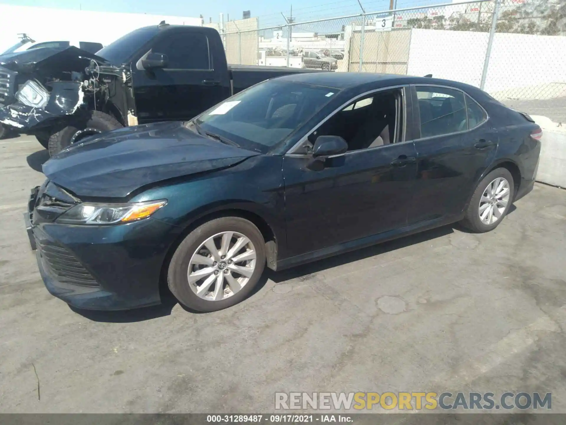 2 Photograph of a damaged car 4T1B11HK3KU709384 TOYOTA CAMRY 2019