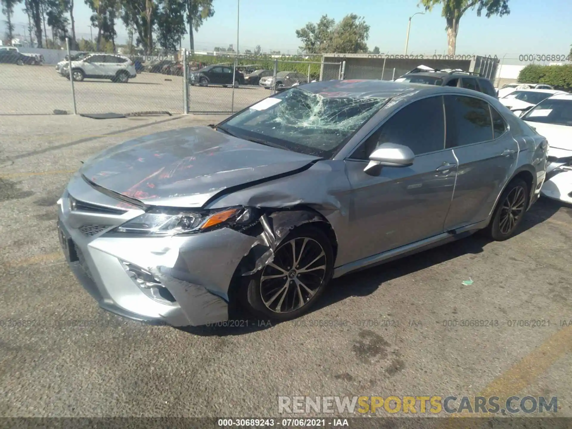 2 Photograph of a damaged car 4T1B11HK3KU710924 TOYOTA CAMRY 2019