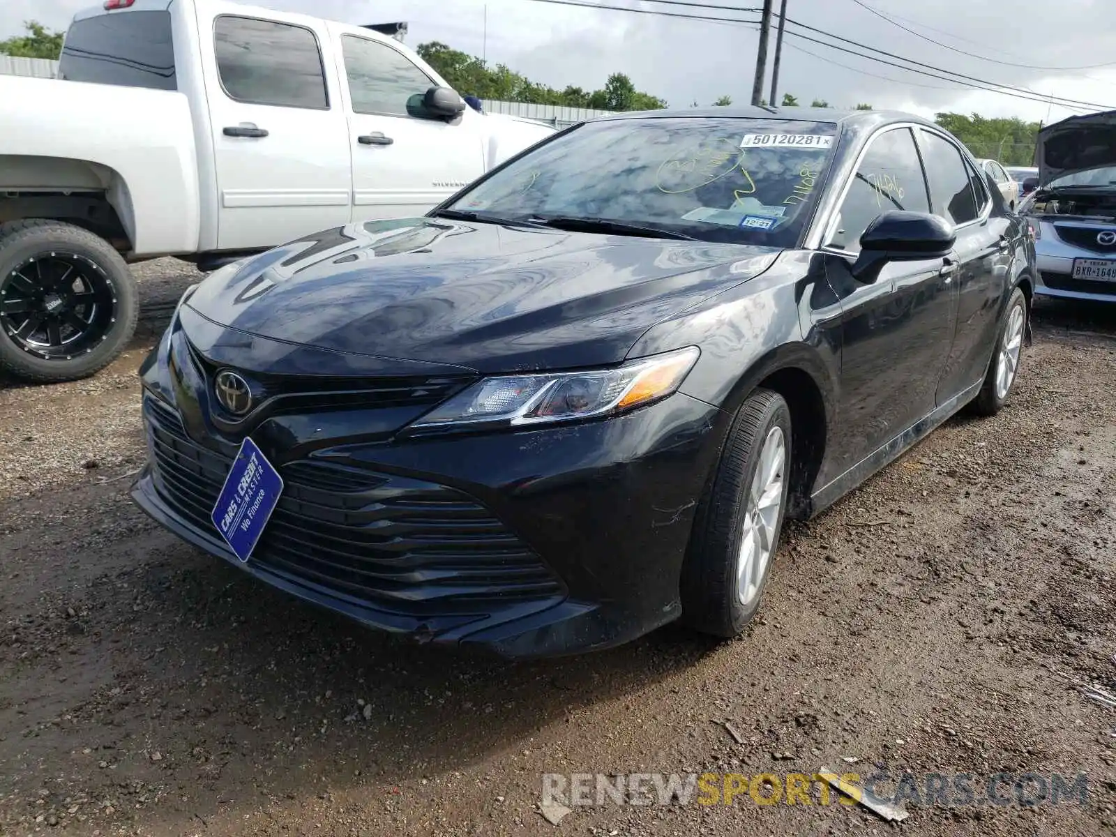 2 Photograph of a damaged car 4T1B11HK3KU711085 TOYOTA CAMRY 2019