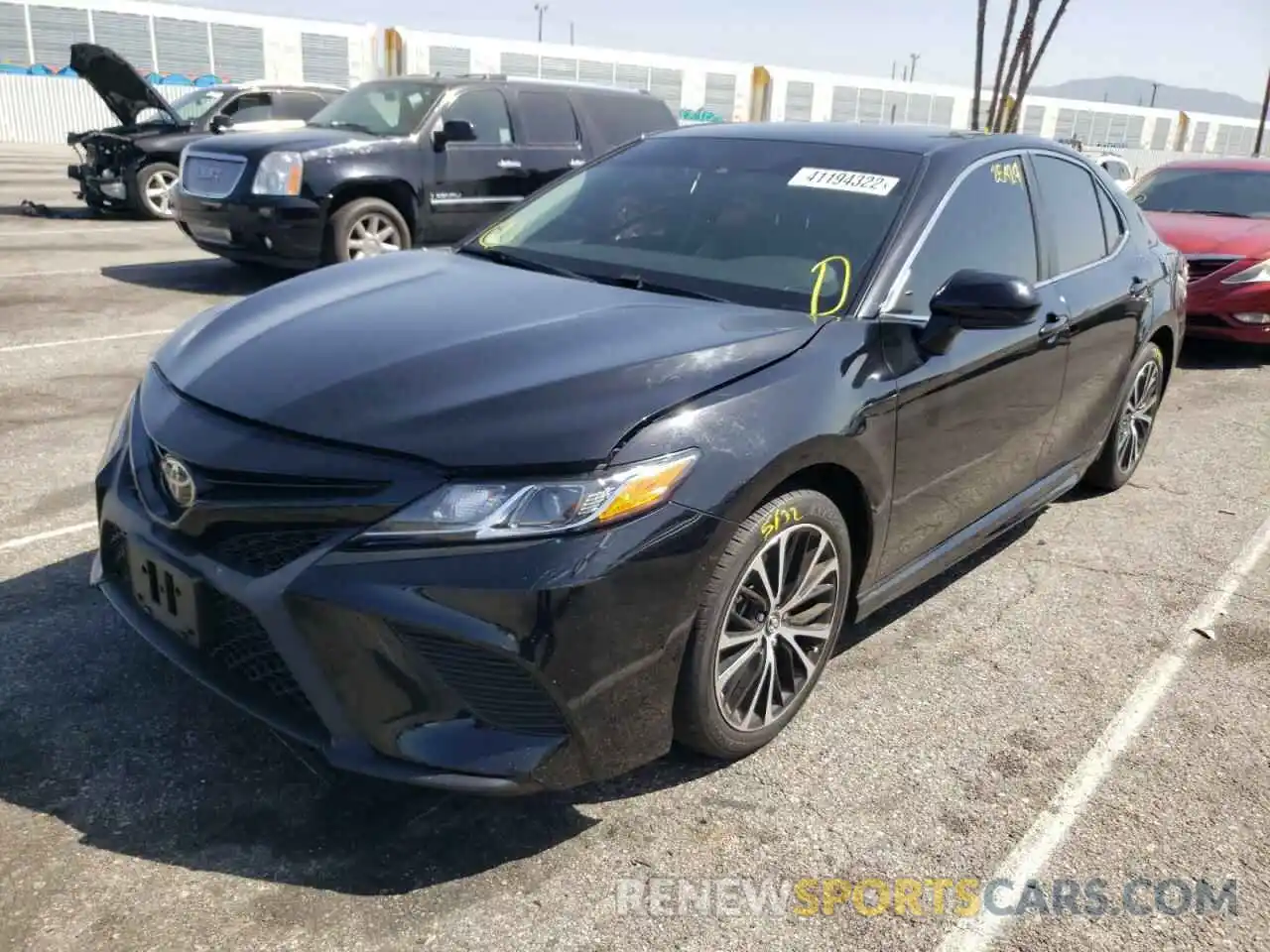 2 Photograph of a damaged car 4T1B11HK3KU712401 TOYOTA CAMRY 2019