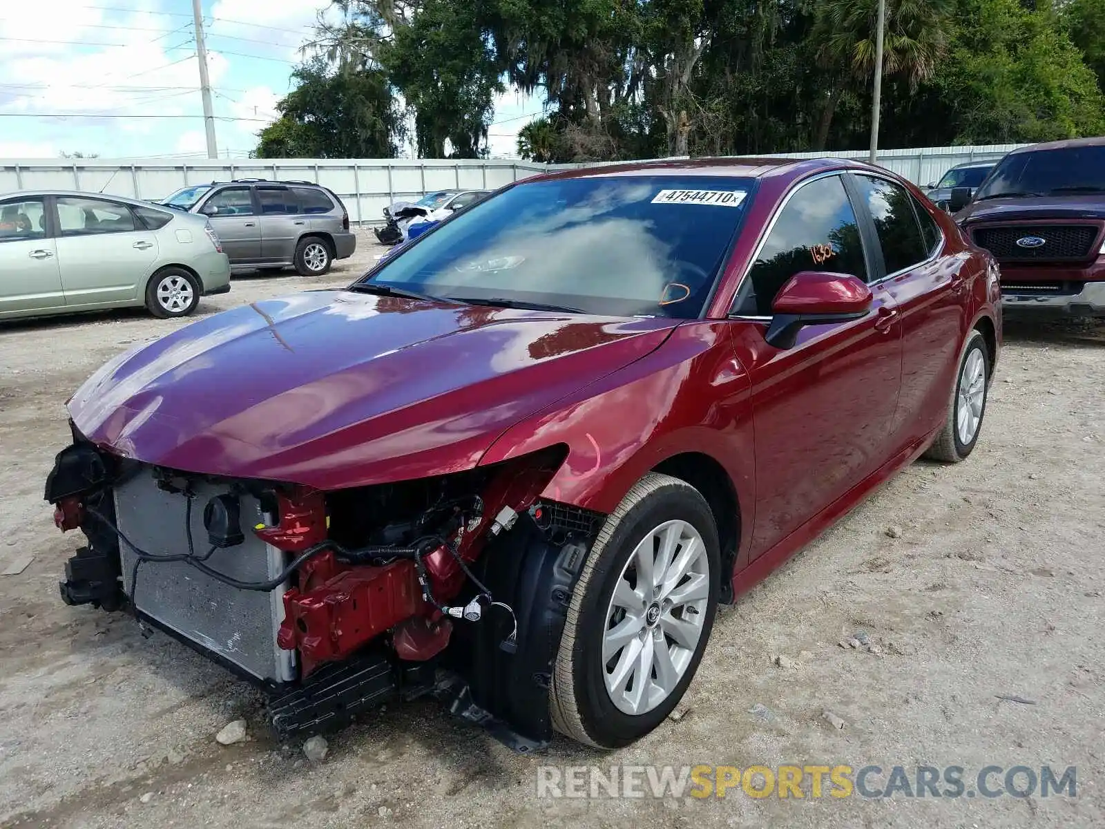 2 Photograph of a damaged car 4T1B11HK3KU714729 TOYOTA CAMRY 2019