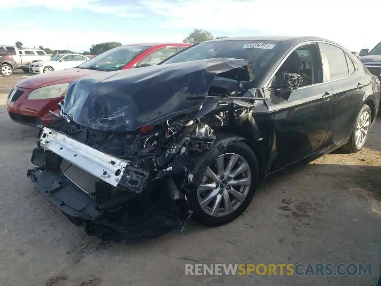 2 Photograph of a damaged car 4T1B11HK3KU715914 TOYOTA CAMRY 2019