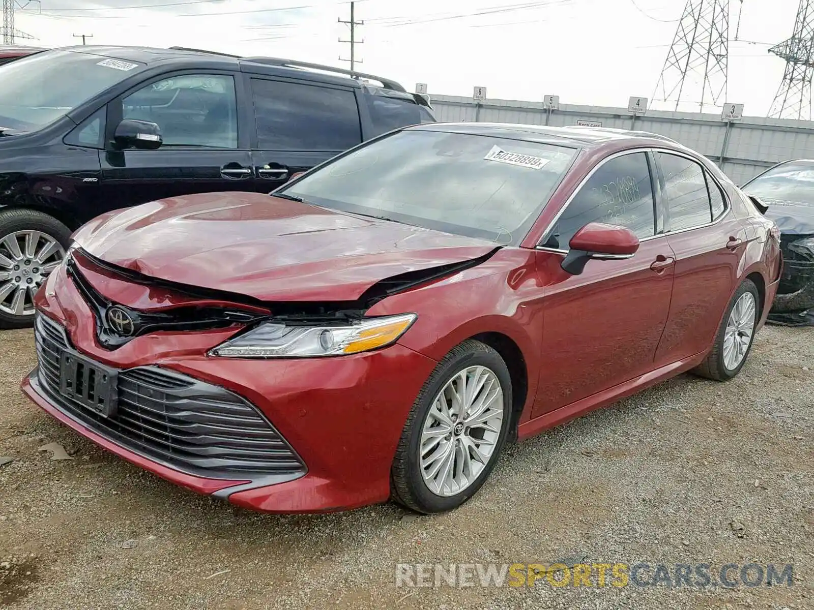 2 Photograph of a damaged car 4T1B11HK3KU720627 TOYOTA CAMRY 2019