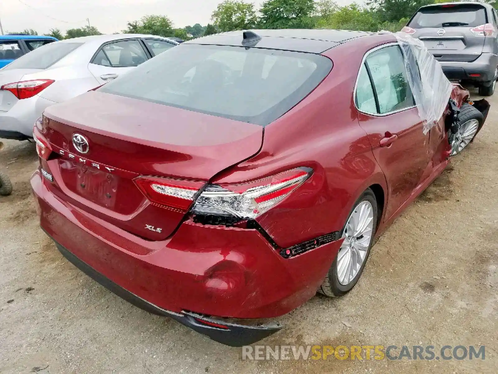 4 Photograph of a damaged car 4T1B11HK3KU721132 TOYOTA CAMRY 2019