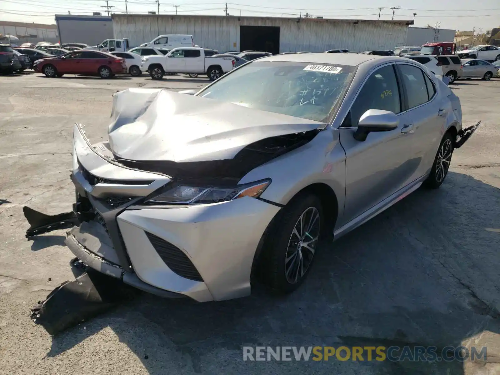 2 Photograph of a damaged car 4T1B11HK3KU721597 TOYOTA CAMRY 2019