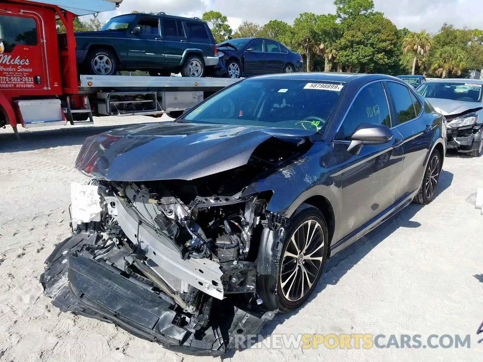 2 Photograph of a damaged car 4T1B11HK3KU724631 TOYOTA CAMRY 2019