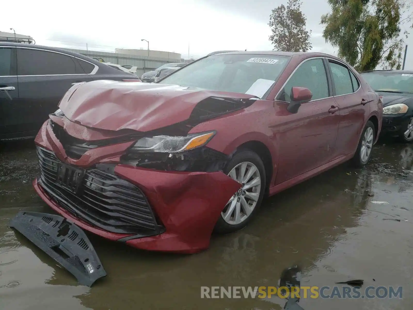 2 Photograph of a damaged car 4T1B11HK3KU729893 TOYOTA CAMRY 2019