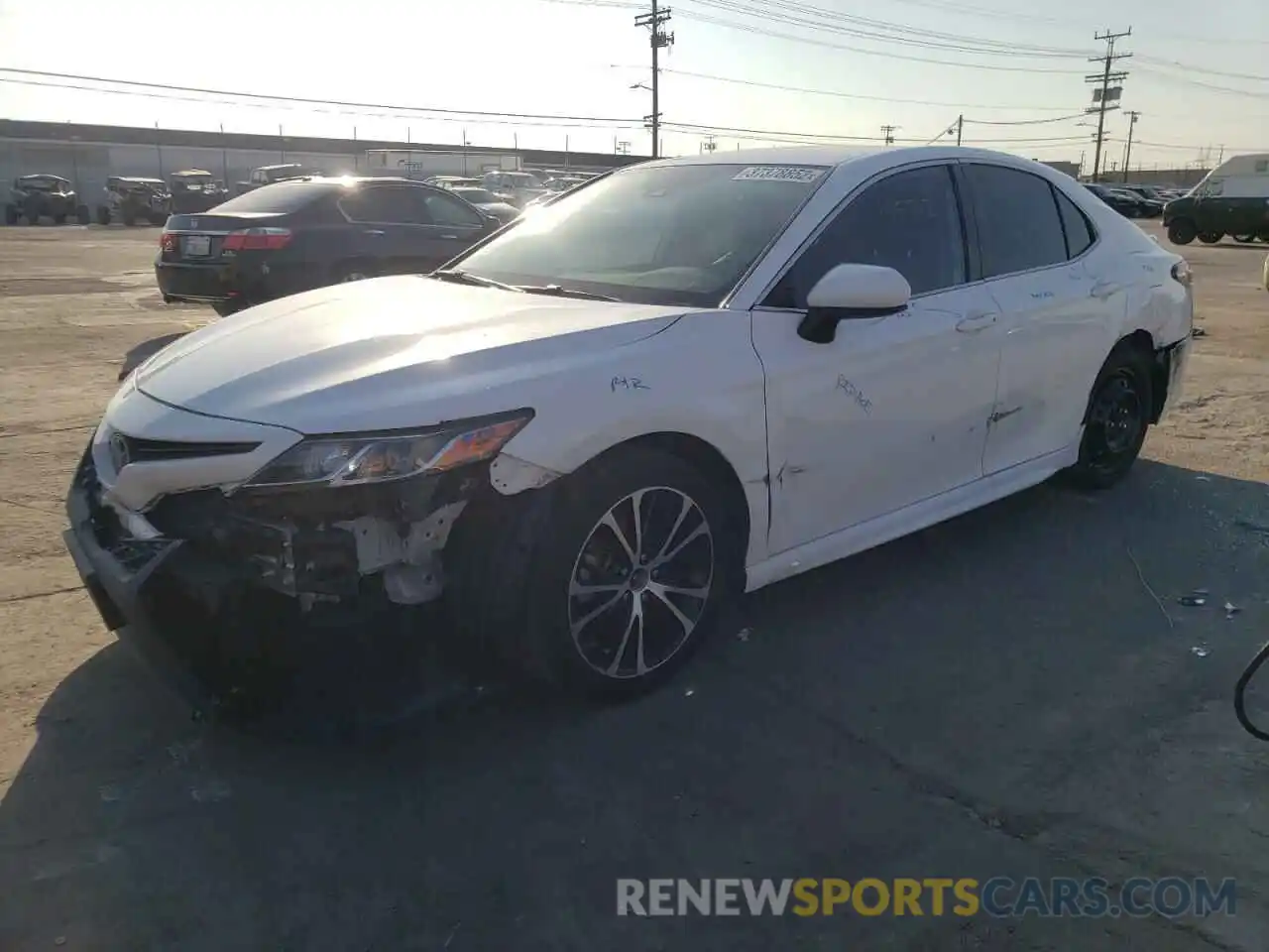 2 Photograph of a damaged car 4T1B11HK3KU734690 TOYOTA CAMRY 2019