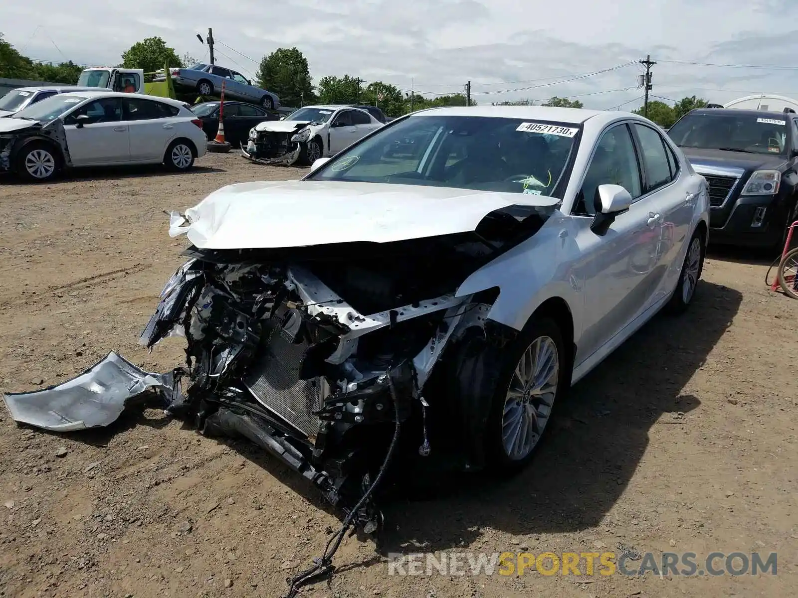 2 Photograph of a damaged car 4T1B11HK3KU736522 TOYOTA CAMRY 2019