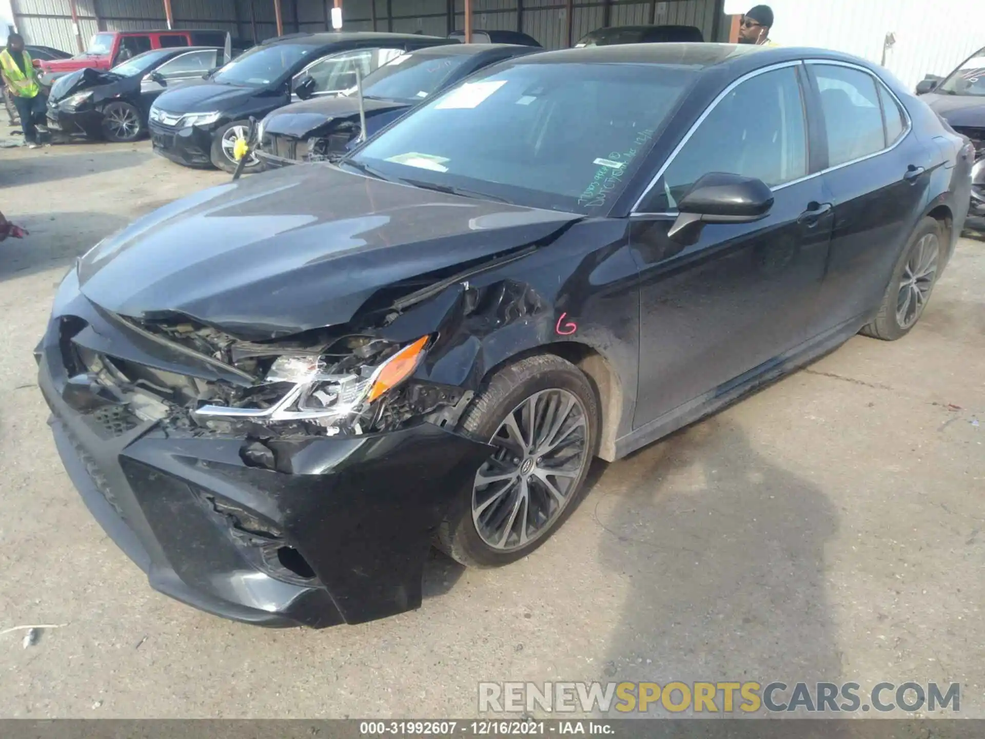 2 Photograph of a damaged car 4T1B11HK3KU737900 TOYOTA CAMRY 2019