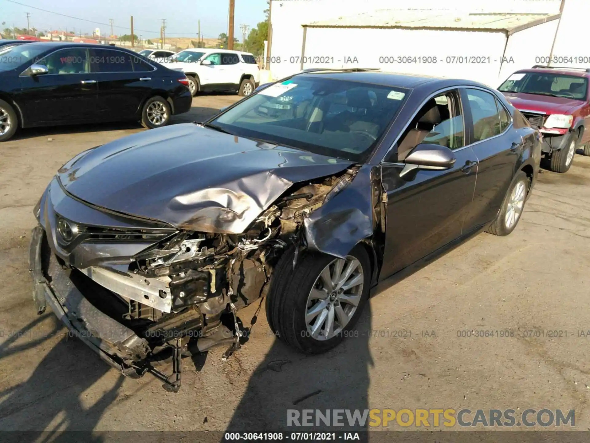 2 Photograph of a damaged car 4T1B11HK3KU737931 TOYOTA CAMRY 2019