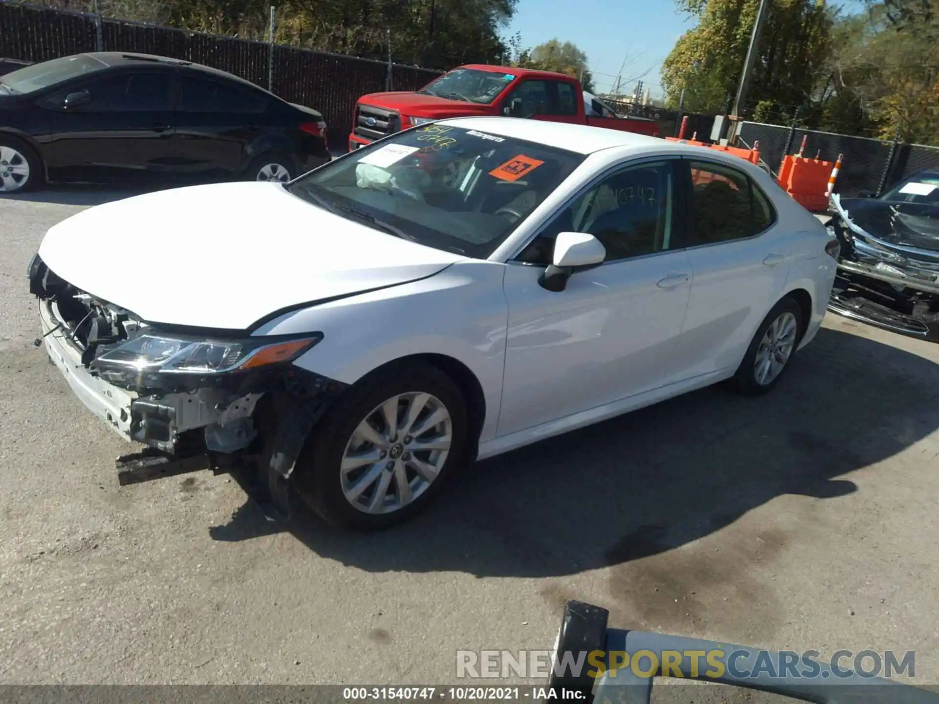 2 Photograph of a damaged car 4T1B11HK3KU740263 TOYOTA CAMRY 2019