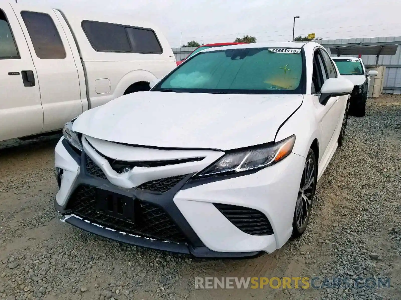 2 Photograph of a damaged car 4T1B11HK3KU742935 TOYOTA CAMRY 2019