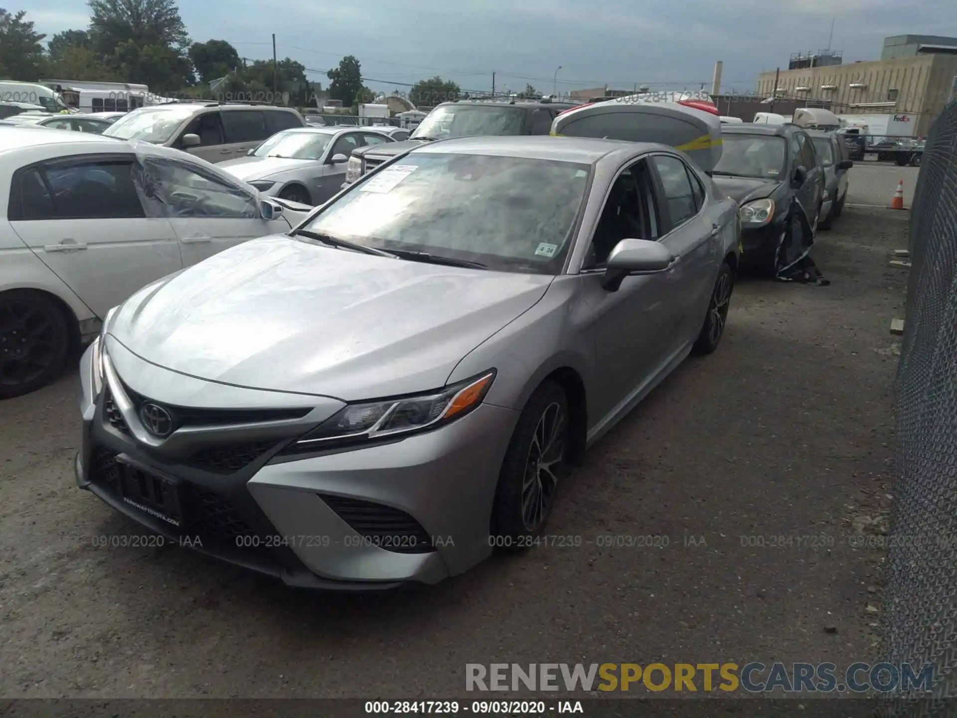 2 Photograph of a damaged car 4T1B11HK3KU744748 TOYOTA CAMRY 2019