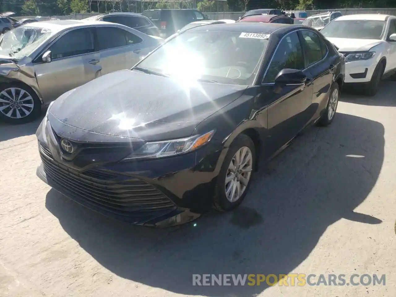 2 Photograph of a damaged car 4T1B11HK3KU750873 TOYOTA CAMRY 2019