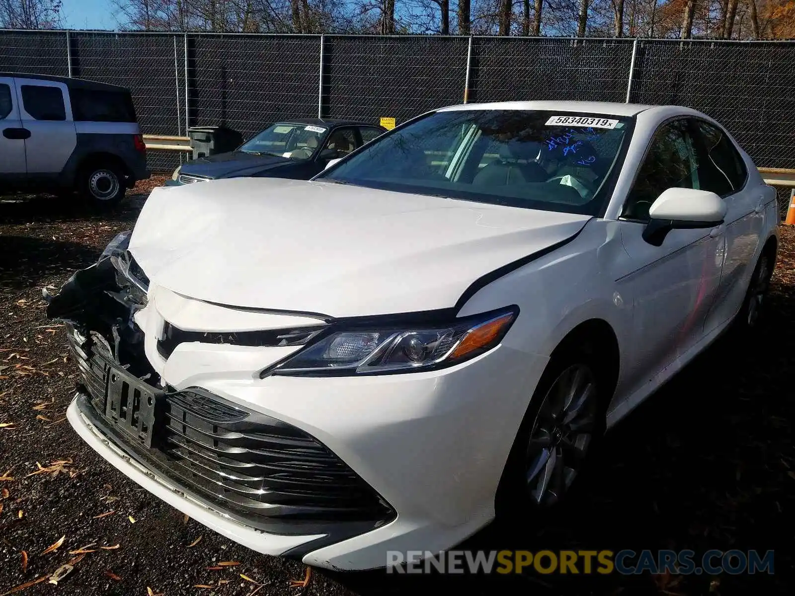 2 Photograph of a damaged car 4T1B11HK3KU765003 TOYOTA CAMRY 2019