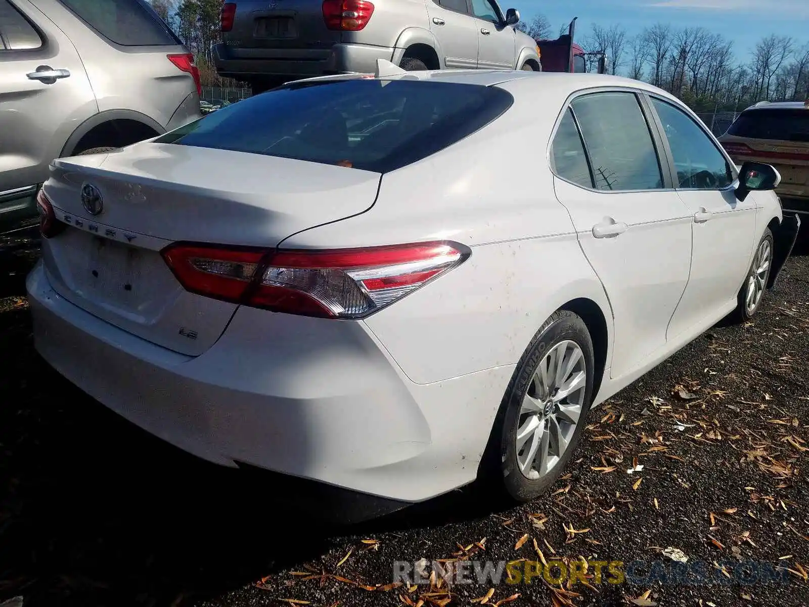 4 Photograph of a damaged car 4T1B11HK3KU765003 TOYOTA CAMRY 2019