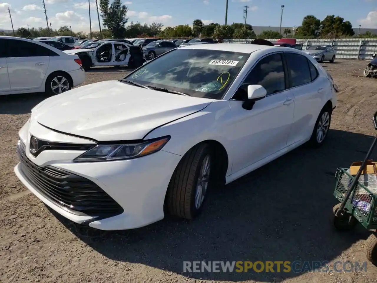 2 Photograph of a damaged car 4T1B11HK3KU768936 TOYOTA CAMRY 2019