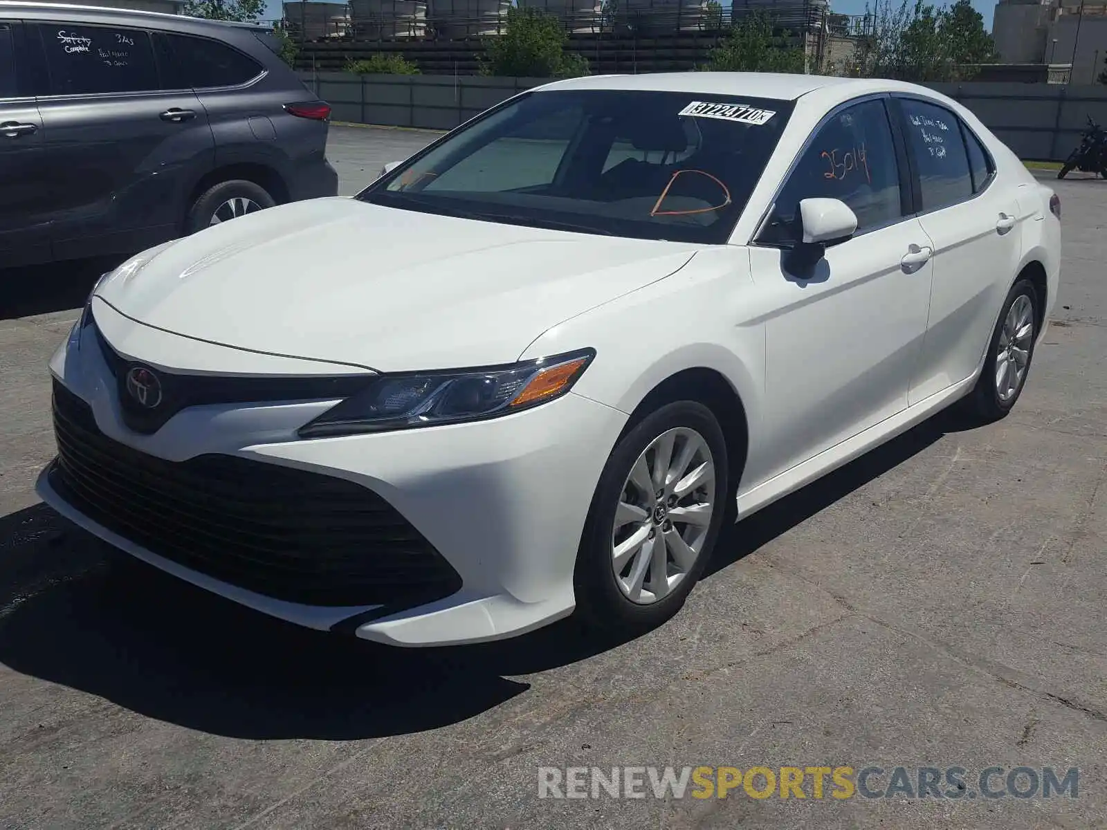 2 Photograph of a damaged car 4T1B11HK3KU769164 TOYOTA CAMRY 2019