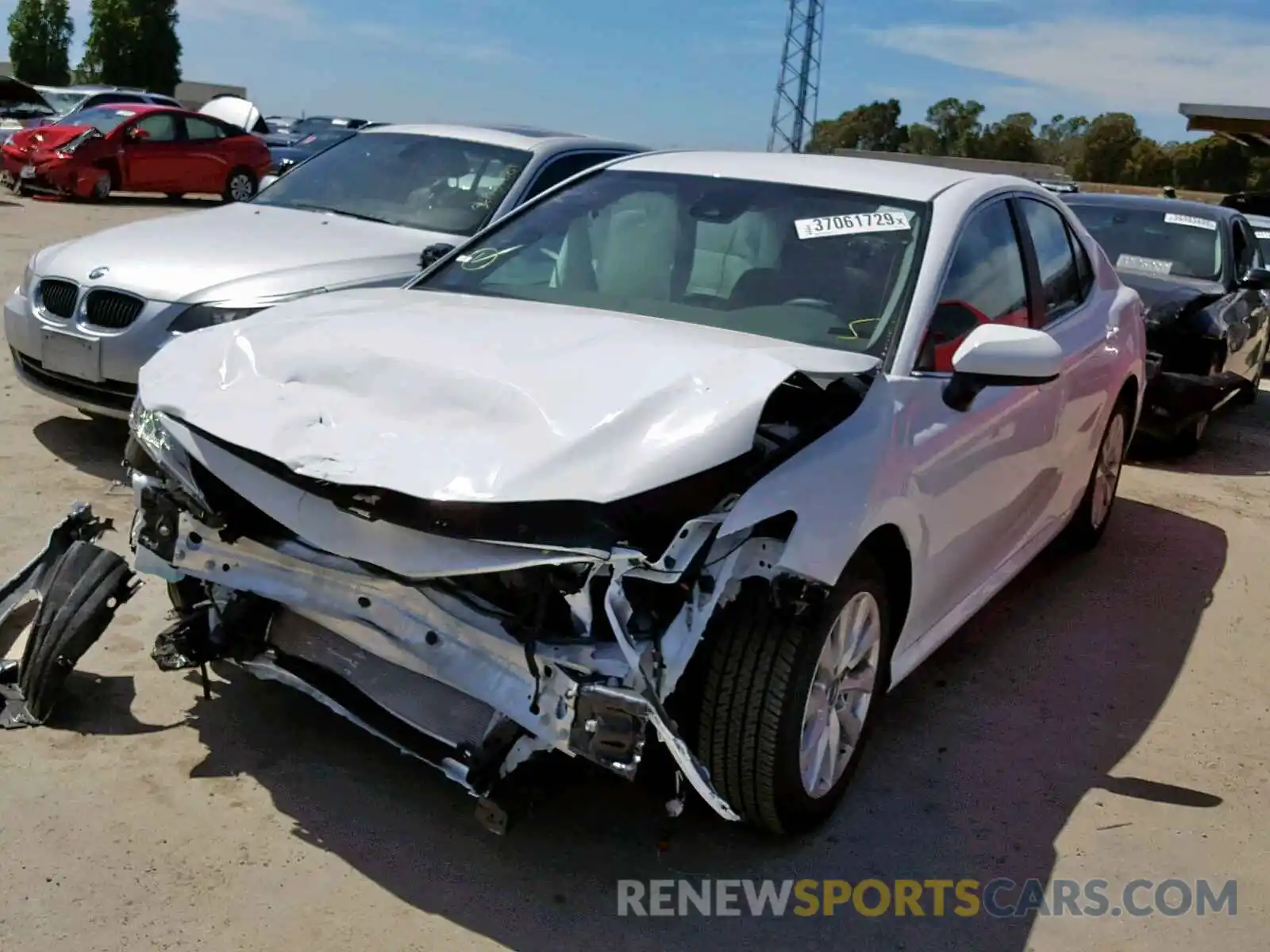 2 Photograph of a damaged car 4T1B11HK3KU772369 TOYOTA CAMRY 2019