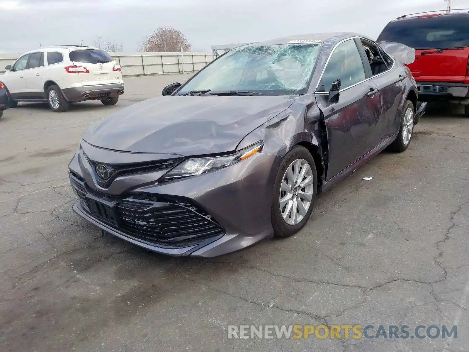 2 Photograph of a damaged car 4T1B11HK3KU773523 TOYOTA CAMRY 2019