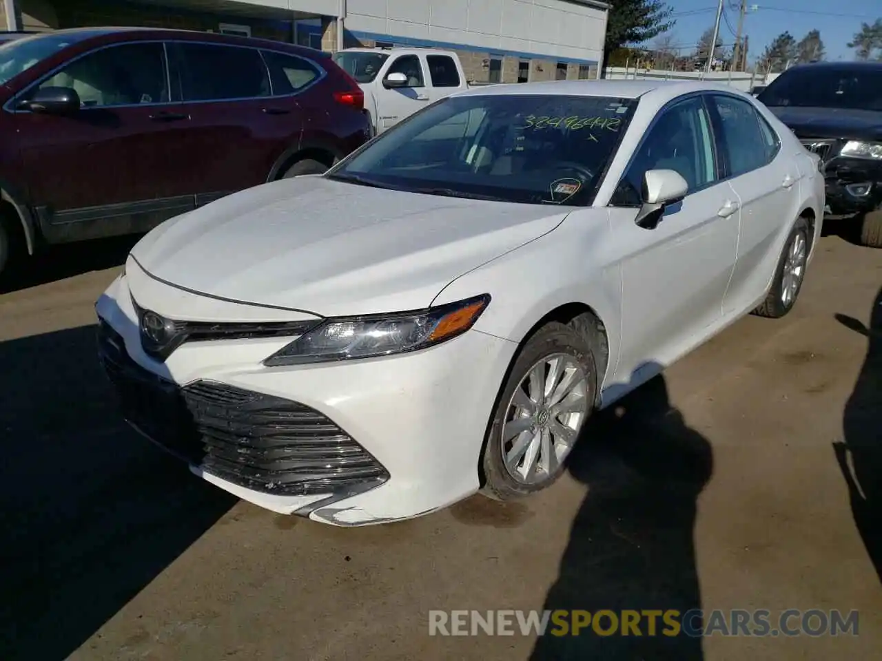 2 Photograph of a damaged car 4T1B11HK3KU774039 TOYOTA CAMRY 2019