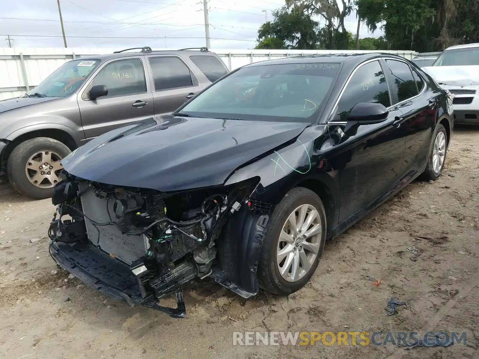 2 Photograph of a damaged car 4T1B11HK3KU774820 TOYOTA CAMRY 2019