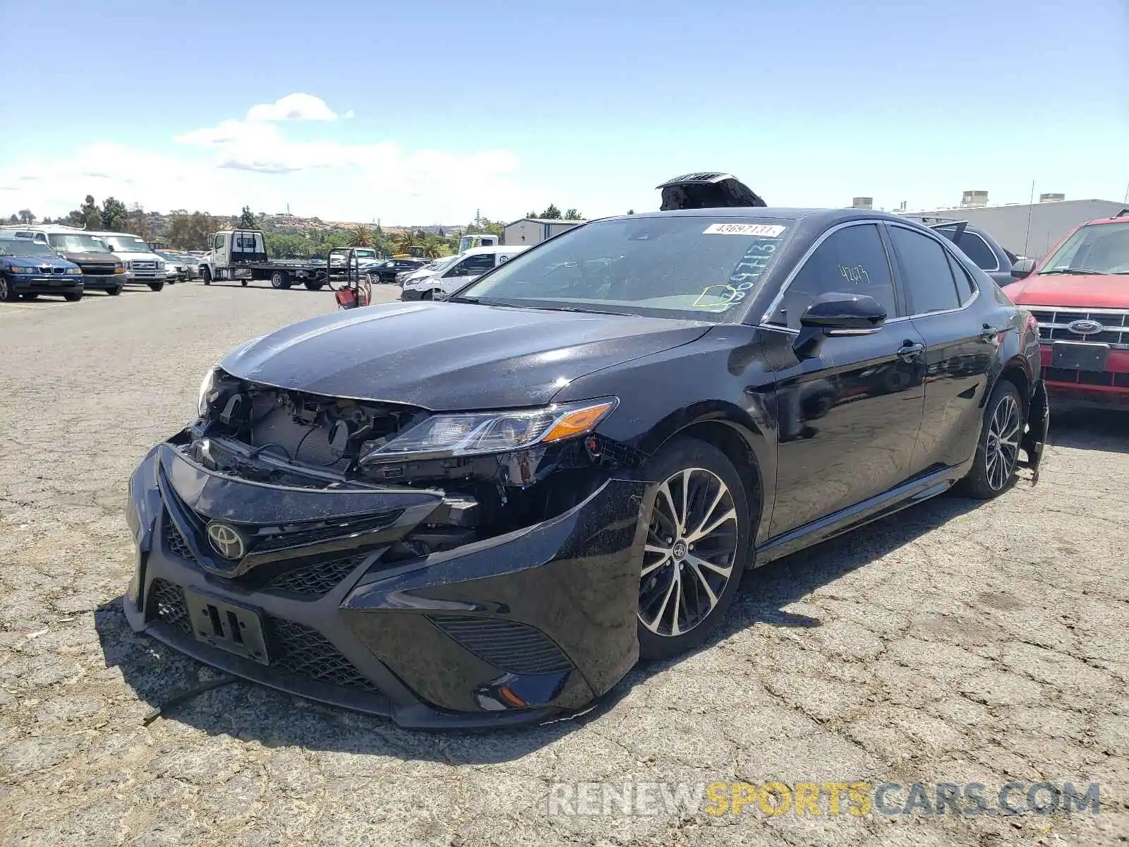 2 Photograph of a damaged car 4T1B11HK3KU778771 TOYOTA CAMRY 2019