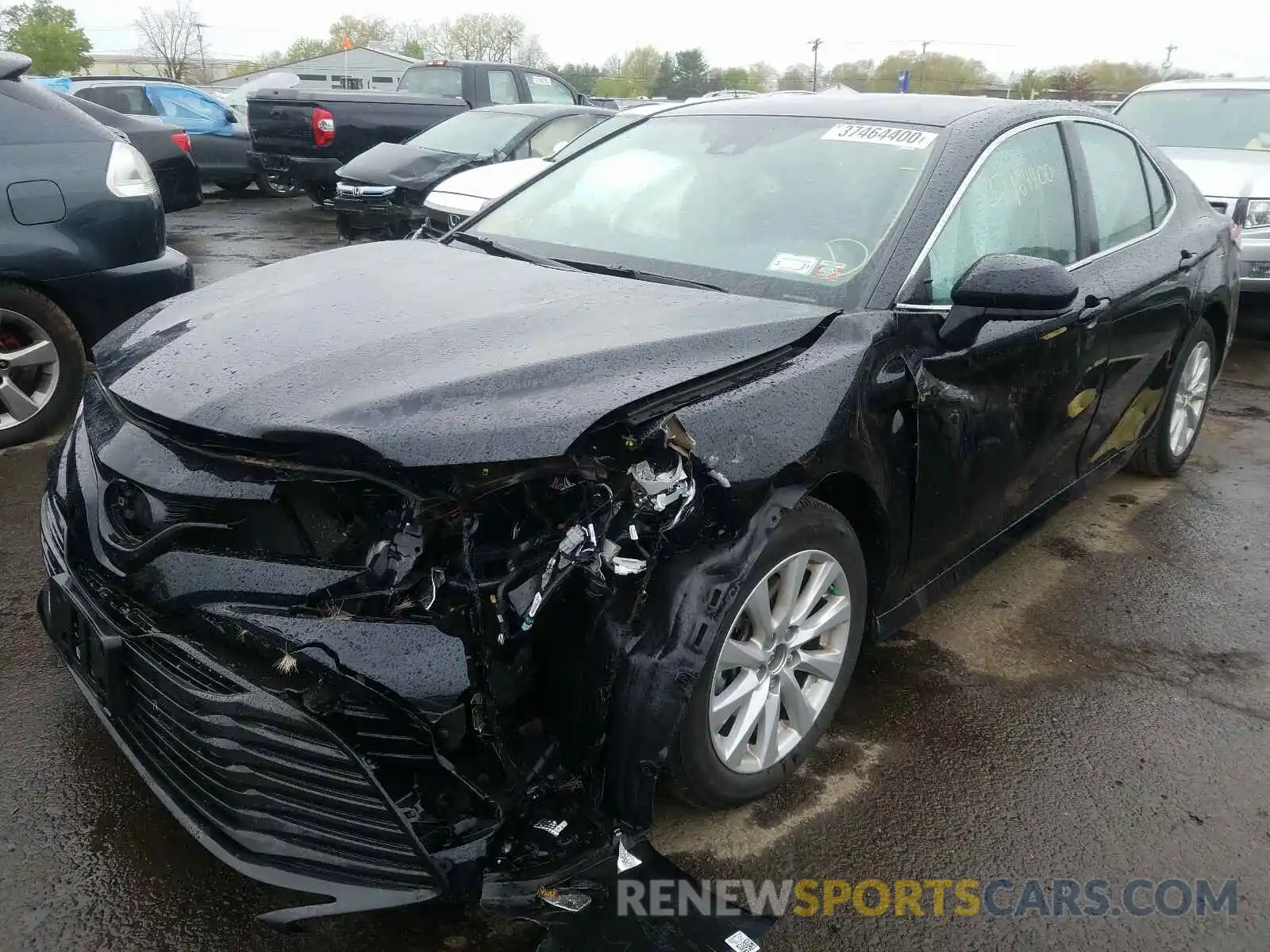 2 Photograph of a damaged car 4T1B11HK3KU779712 TOYOTA CAMRY 2019