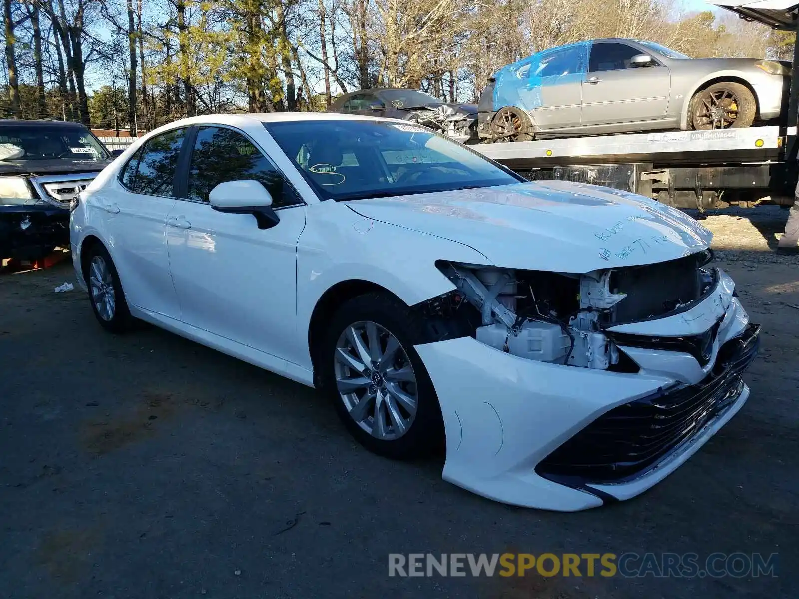 1 Photograph of a damaged car 4T1B11HK3KU784425 TOYOTA CAMRY 2019