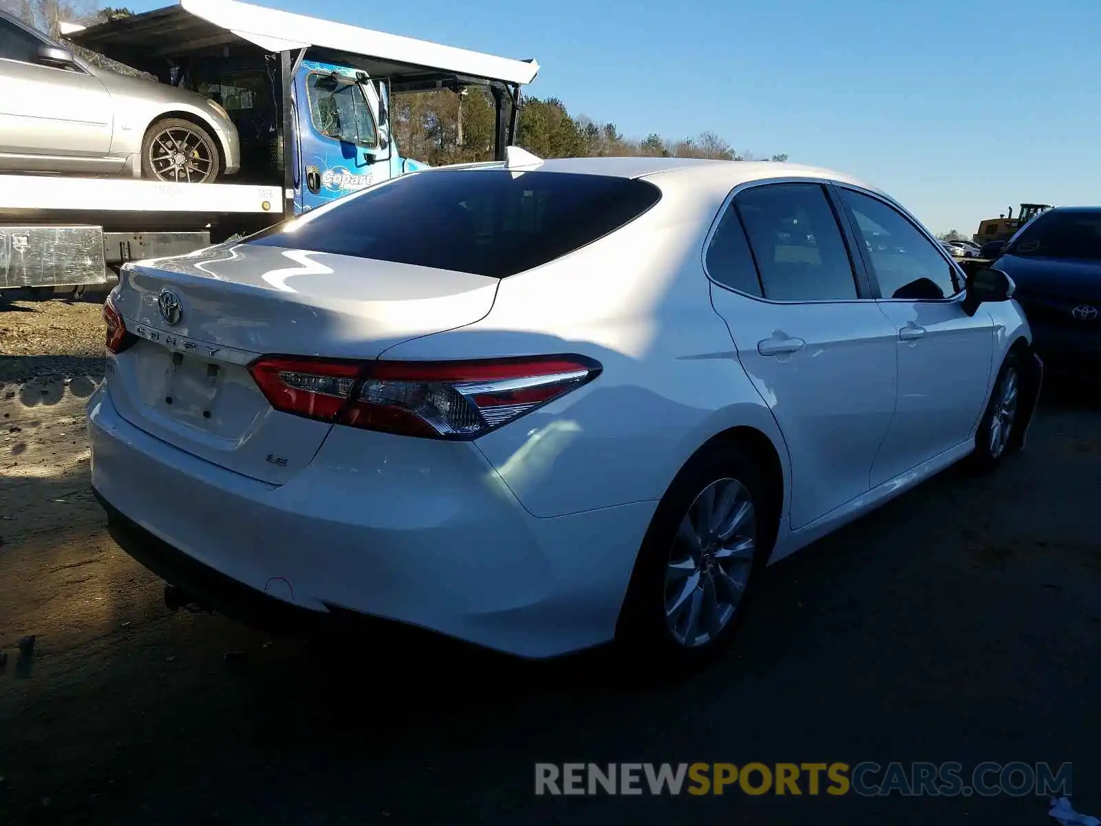 4 Photograph of a damaged car 4T1B11HK3KU784425 TOYOTA CAMRY 2019