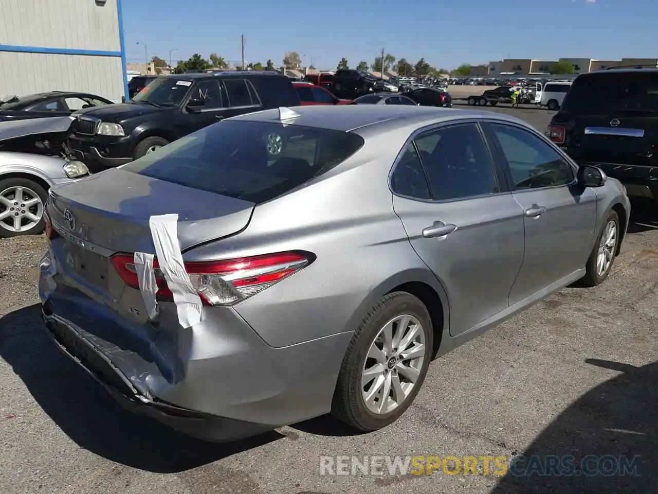 4 Photograph of a damaged car 4T1B11HK3KU787020 TOYOTA CAMRY 2019