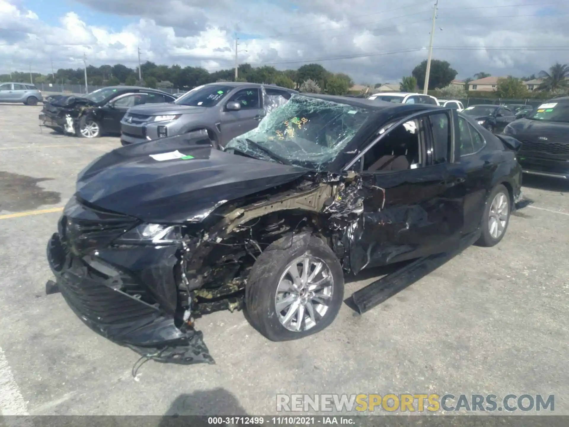 2 Photograph of a damaged car 4T1B11HK3KU788104 TOYOTA CAMRY 2019