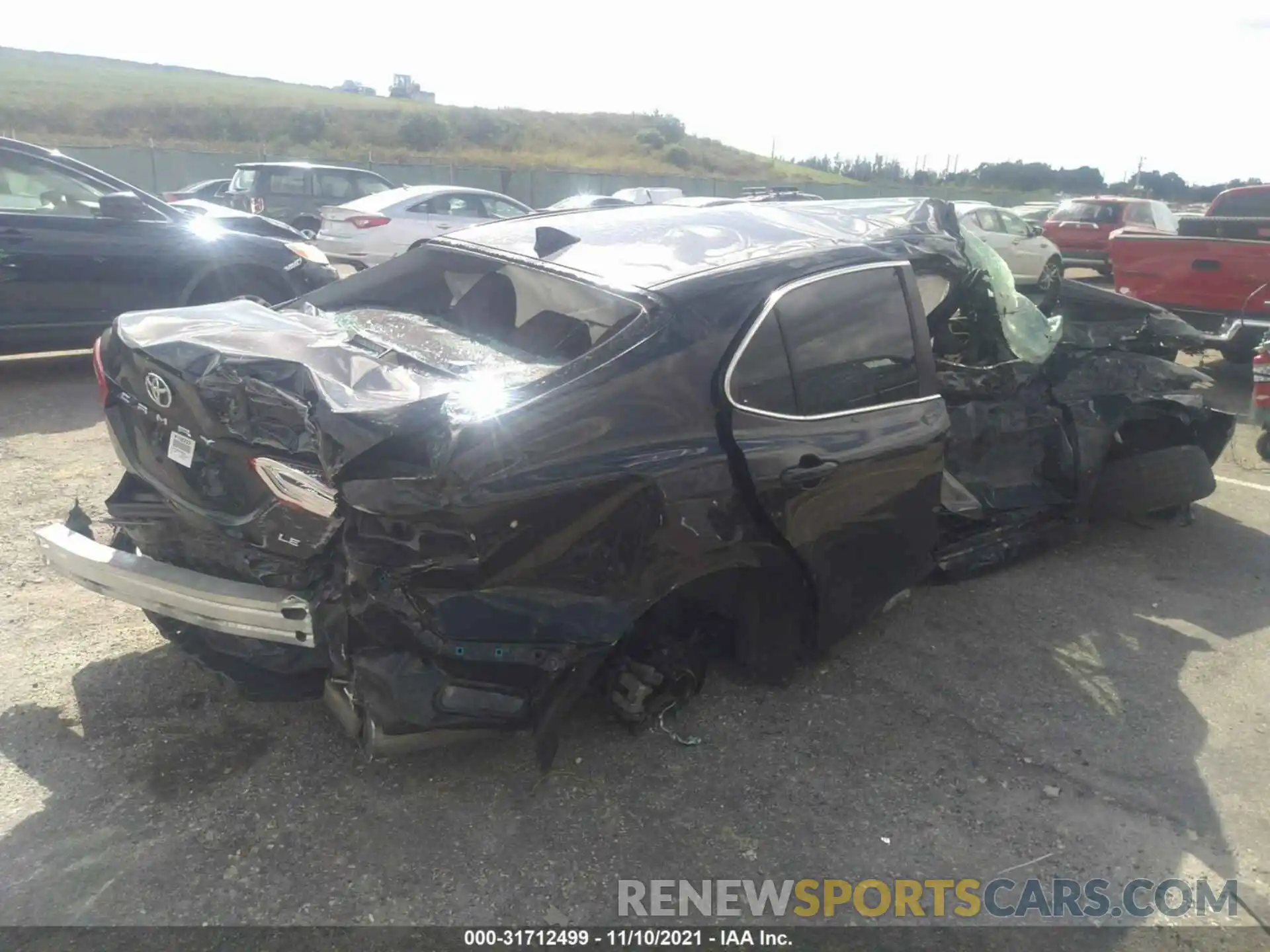 4 Photograph of a damaged car 4T1B11HK3KU788104 TOYOTA CAMRY 2019