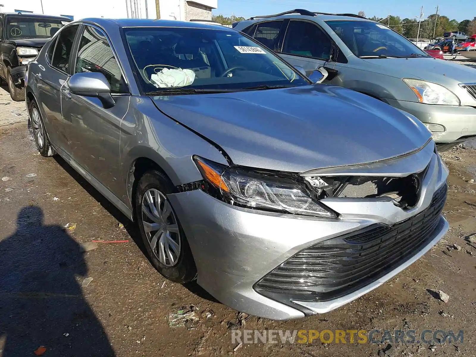 1 Photograph of a damaged car 4T1B11HK3KU789771 TOYOTA CAMRY 2019