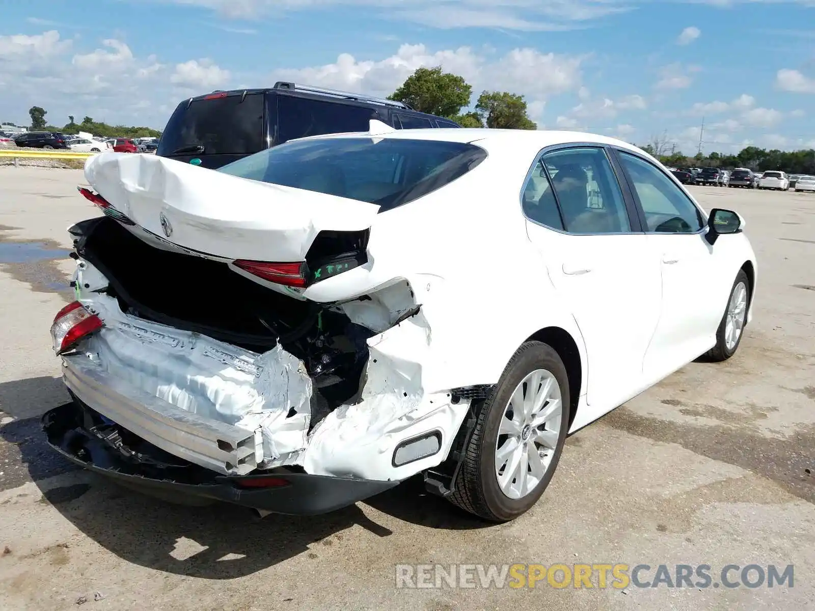 4 Photograph of a damaged car 4T1B11HK3KU791830 TOYOTA CAMRY 2019